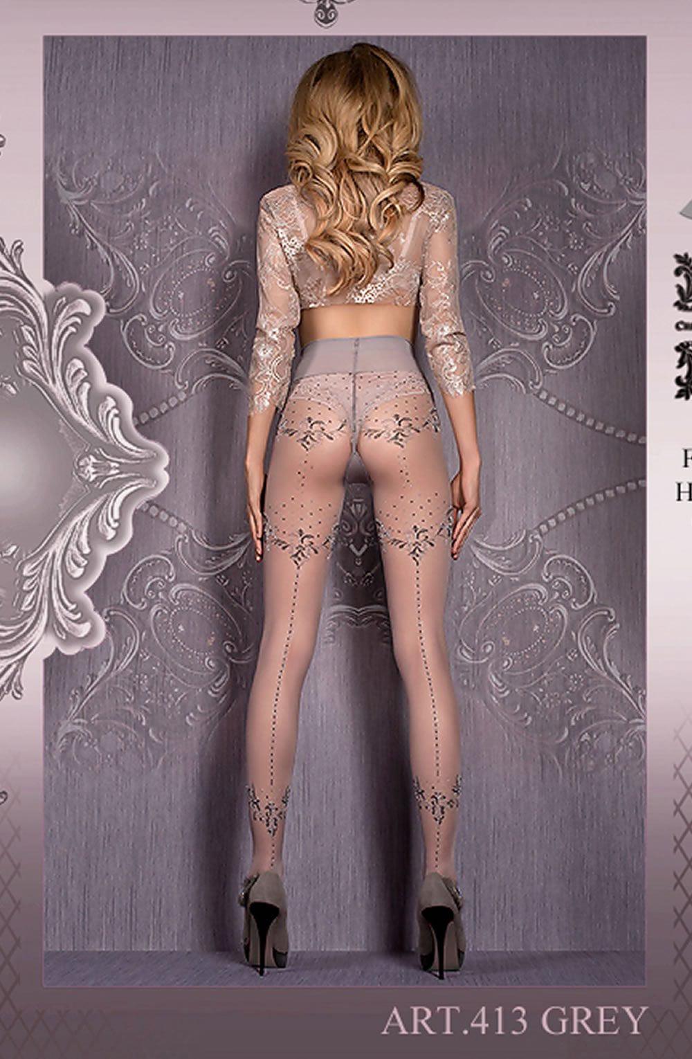 A woman with long, wavy blonde hair stands facing away, modeling sheer, patterned pantyhose and a lace top from the Hush Hush collection. The backdrop features an ornate, decorative design. She wears high-heeled shoes, and the image is labeled "Ballerina 413 Tights Grey" at the bottom right corner.