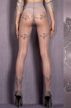 A person is wearing the Ballerina 413 Tights Grey from the Ballerina collection, featuring intricate patterns and dots on the back of the legs and upper thighs. Their feet are in high heels, and they are standing against a gray textured background. The tights have lace detailing on the upper part.