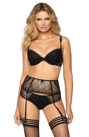 A woman with long blonde hair is modeling luxurious lingerie. She wears the Roza Anuk Black Push Up bra, featuring embroidered detailing and adjustable shoulder straps, paired with black high-waisted panties, and a sheer black garter belt with matching thigh-high stockings. She looks directly at the camera with a neutral expression.