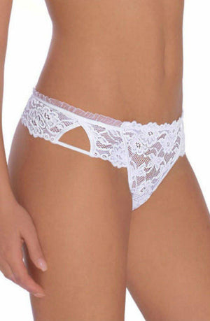 A close-up view showcasing the Roza Carmen White Thong on a woman's torso, featuring intricate floral patterns and decorative cut-out details on the side. The delicate and feminine design is accentuated against a plain, unobtrusive background.