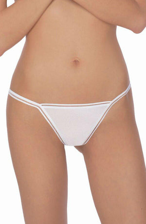 A person wearing the Roza Fiona Thong White stands against a plain background, arms crossed over their chest, with the back detail partially out of the frame.