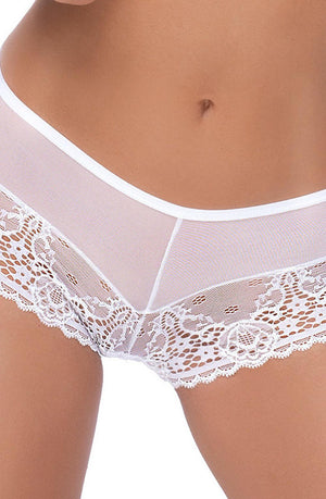 Close-up view of a person wearing the Roza Genezis White shorty briefs from Roza. The underwear showcases sheer white lace with intricate floral patterns, combining semi-sheer fabric and detailed lace trim on the legs for a delicate and elegant appearance.