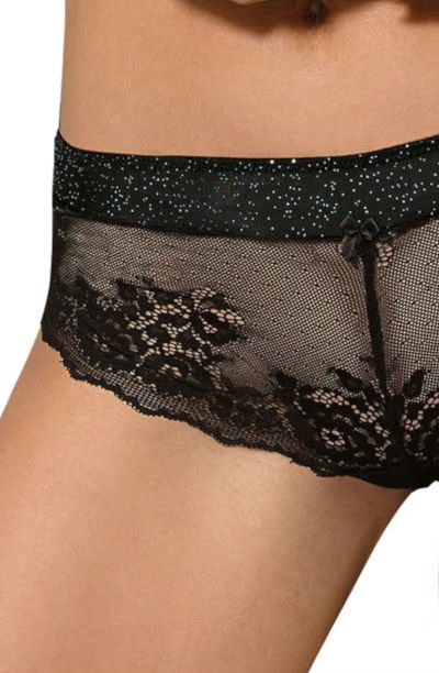 Close-up of a person's midsection wearing the Roza Kena Black Brief by Roza, featuring seductive black floral lace and a glittery waistband. The intricate lace design boasts a delicate floral pattern, complemented by a small bow at the center of the waistband. The background is white.