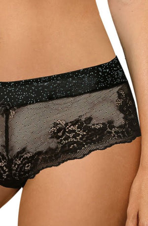 A close-up image showcases a person wearing the Roza Kena Black Brief by Roza. The design features sheer fabric with intricate floral lace at the bottom and a starry pattern at the waistband, perfectly complementing our seductive thongs collection. The person stands against a plain white background.