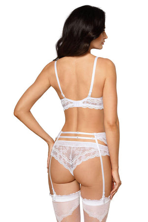 A woman with long dark hair is shown from the back, wearing a detailed Roza Lagerta Push Up White lingerie set by Roza. The ensemble includes a bra, garter belt, thong, and thigh-high stockings with lace tops. The design showcases delicate lace patterns and adjustable straps for an ideal fit.