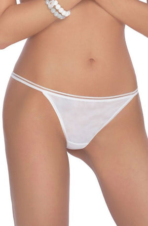 A person wearing the Roza Lea Thong White, featuring thin straps and delicate lace detailing, stands against a plain white background. Their midsection is visible, and their arms rest near their sides. White beaded bracelets adorn their left wrist.