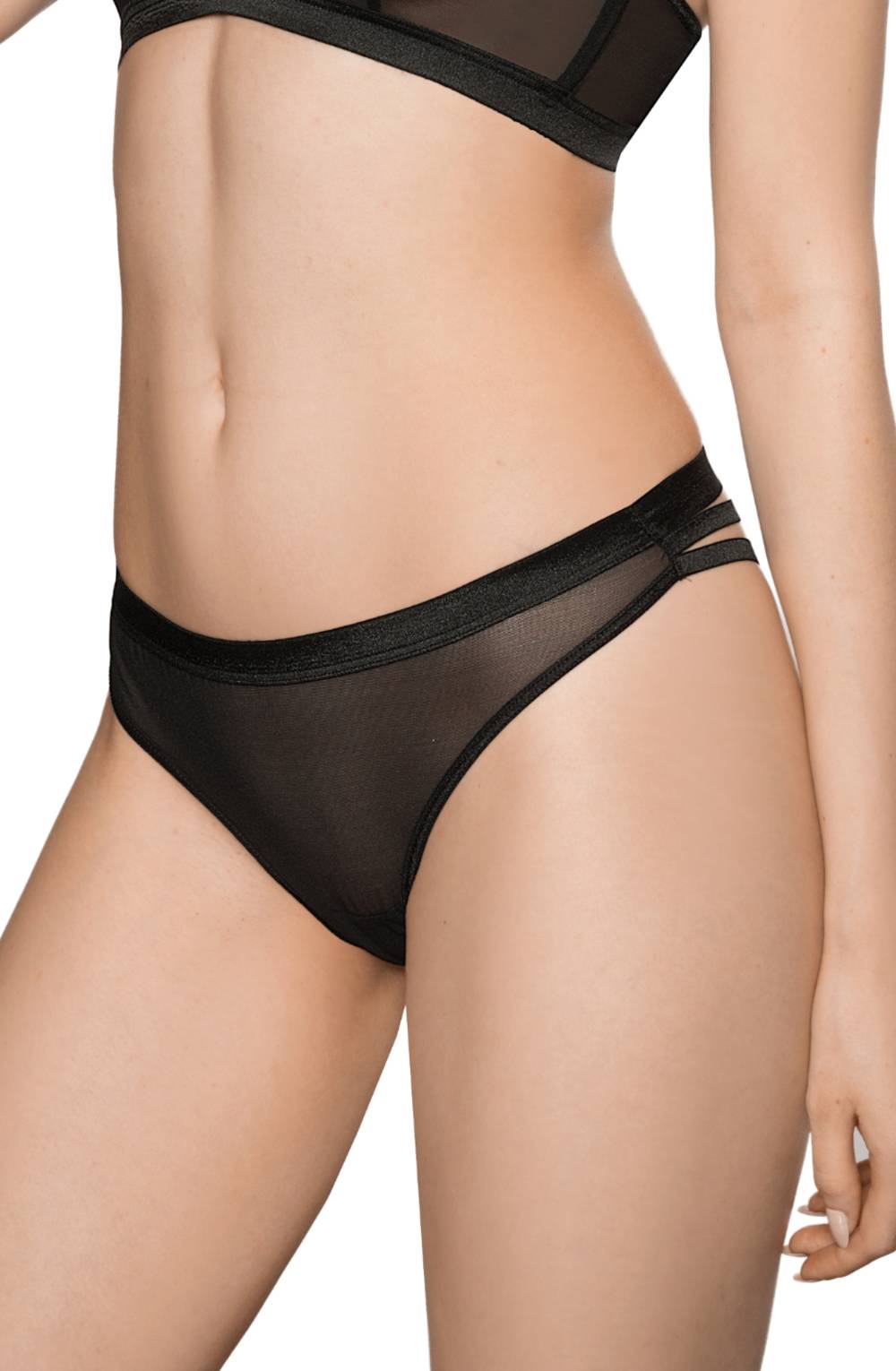 A person wearing black mesh lingerie by Roza. The bra features thin straps, and the Roza Lisbet Black Thong includes double elastic bands on one side. The view is cropped to show the torso and upper thighs, without revealing the person's face.