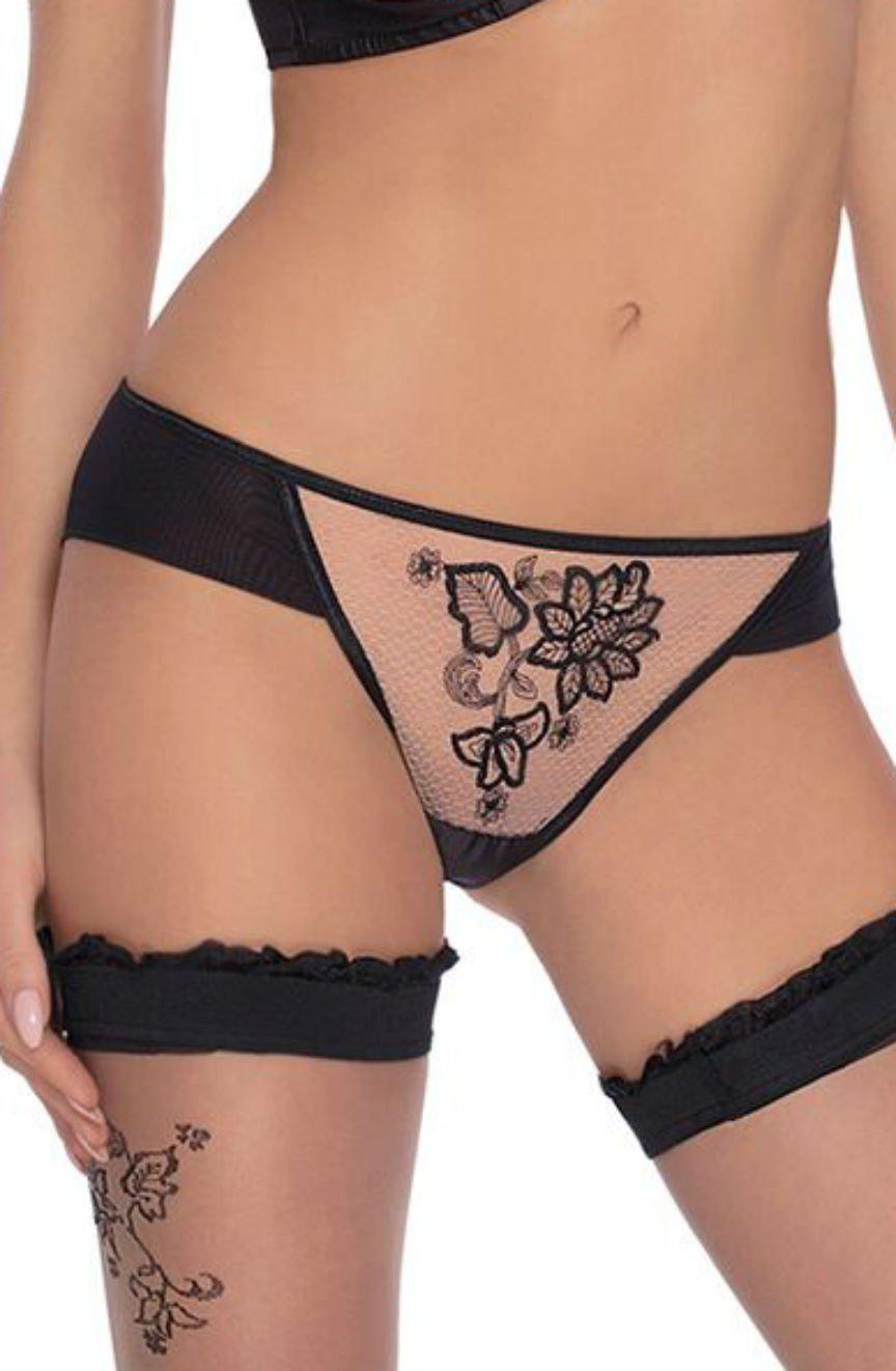 A woman is dressed in the Roza Mehendi Brief Black lingerie with floral embroidery on the front and a premium brief. She pairs it with matching thigh-high stockings featuring a lace band and similar flower design. Her midsection is visible, showcasing the intricate pattern of the lingerie that mirrors Mehendi designs.