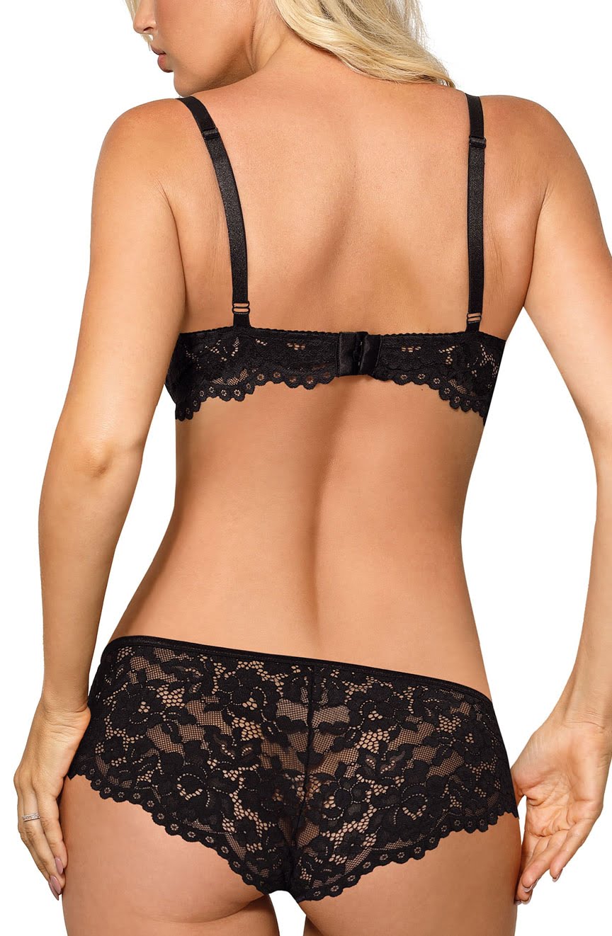 A woman is shown from the back wearing a black lace lingerie set, which includes the Roza Newia Black Push Up Bra and matching panties. The bra, from the renowned brand Roza, features adjustable straps and an intricate lace pattern. The high-waisted panties boast a similar design, making them ideal for those who love mix or match options in their lacy collection.