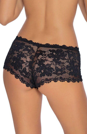 A person is shown from the back, wearing the Roza Olympia Black lace lingerie. The intricate lace design features floral patterns and scalloped edges, giving it an elegant and detailed appearance. The person's skin tone contrasts beautifully with the dark fabric of the Roza Olympia Black briefs by Roza.