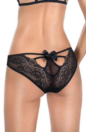 A person is wearing the Roza Zulaj Brief Black, featuring black lace with a bow and cut-out detail at the back. The image focuses on their lower back and buttocks, highlighting the intricate lace design by Roza. The person's light skin tone perfectly complements the romantic push-up bra that accompanies this set.