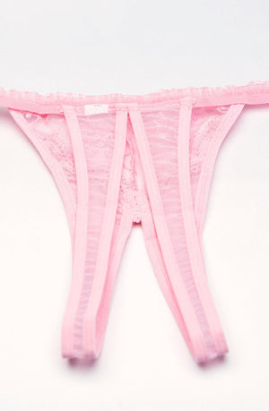 A close-up image of the Shirley Of Hollywood 10 Crotchless Thong Pink lingerie from Shirley of Hollywood. The design features multiple horizontal and vertical bands, creating a revealing, intricate pattern. The lace and mesh materials give a delicate and stylish appearance against the light background, making it a standout in any lingerie collection.